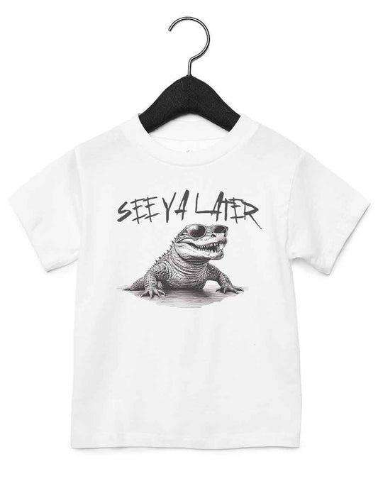 Toddler t-shirt featuring a funny illustrated animal design of an alligator wearing sunglasses – playful and cool kids tee with bold nature-inspired graphic, perfect for adventurous toddlers, unique kids gift or trendy preschool outfit.
