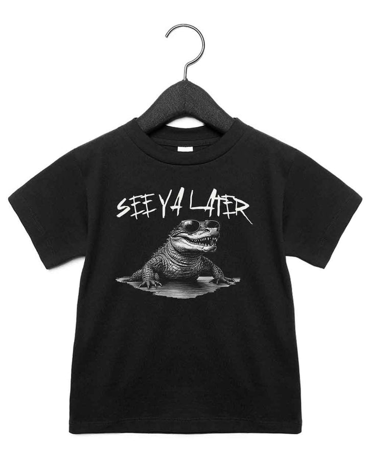 Toddler t-shirt featuring a funny illustrated animal design of an alligator wearing sunglasses – playful and cool kids tee with bold nature-inspired graphic, perfect for adventurous toddlers, unique kids gift or trendy preschool outfit.