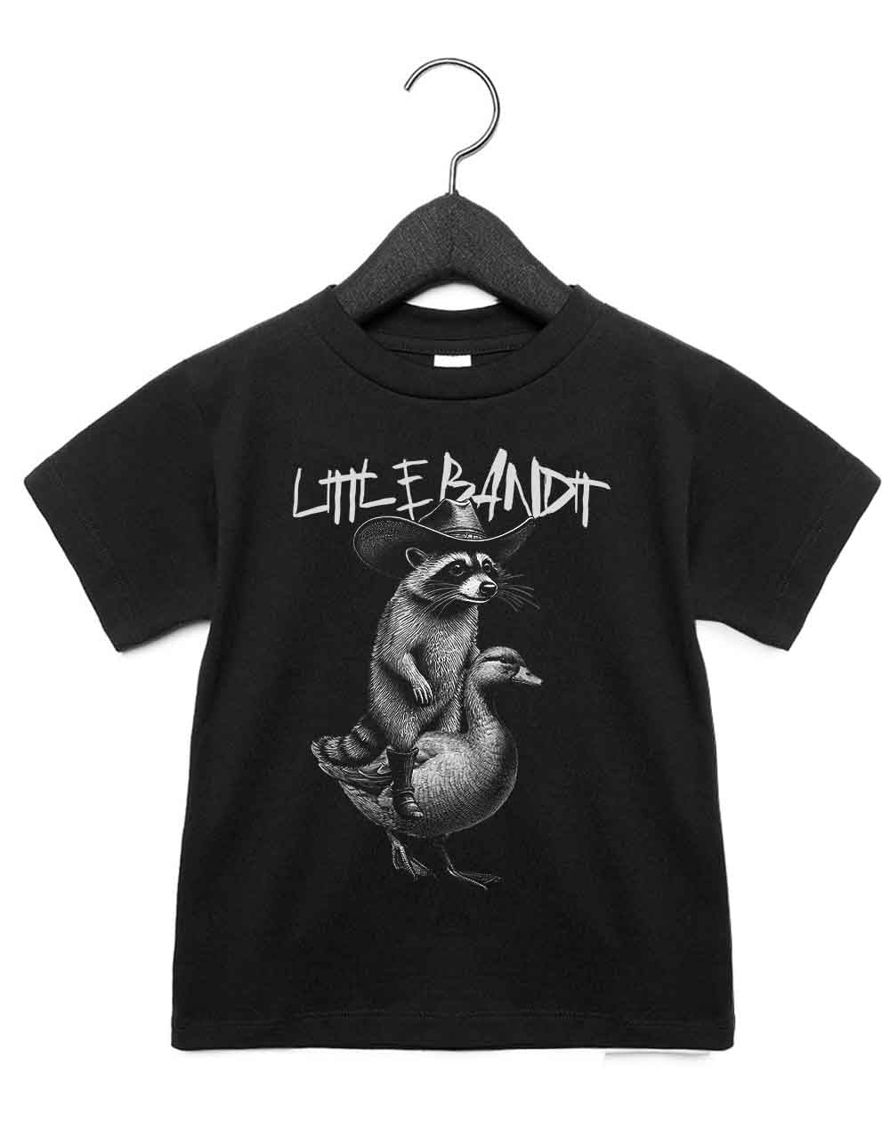 Toddler t-shirt featuring a funny illustrated animal design of a funny raccoon rriding a goose like a horse – playful and cool kids tee with bold nature-inspired graphic, perfect for adventurous toddlers, unique kids gift or trendy preschool outfit.