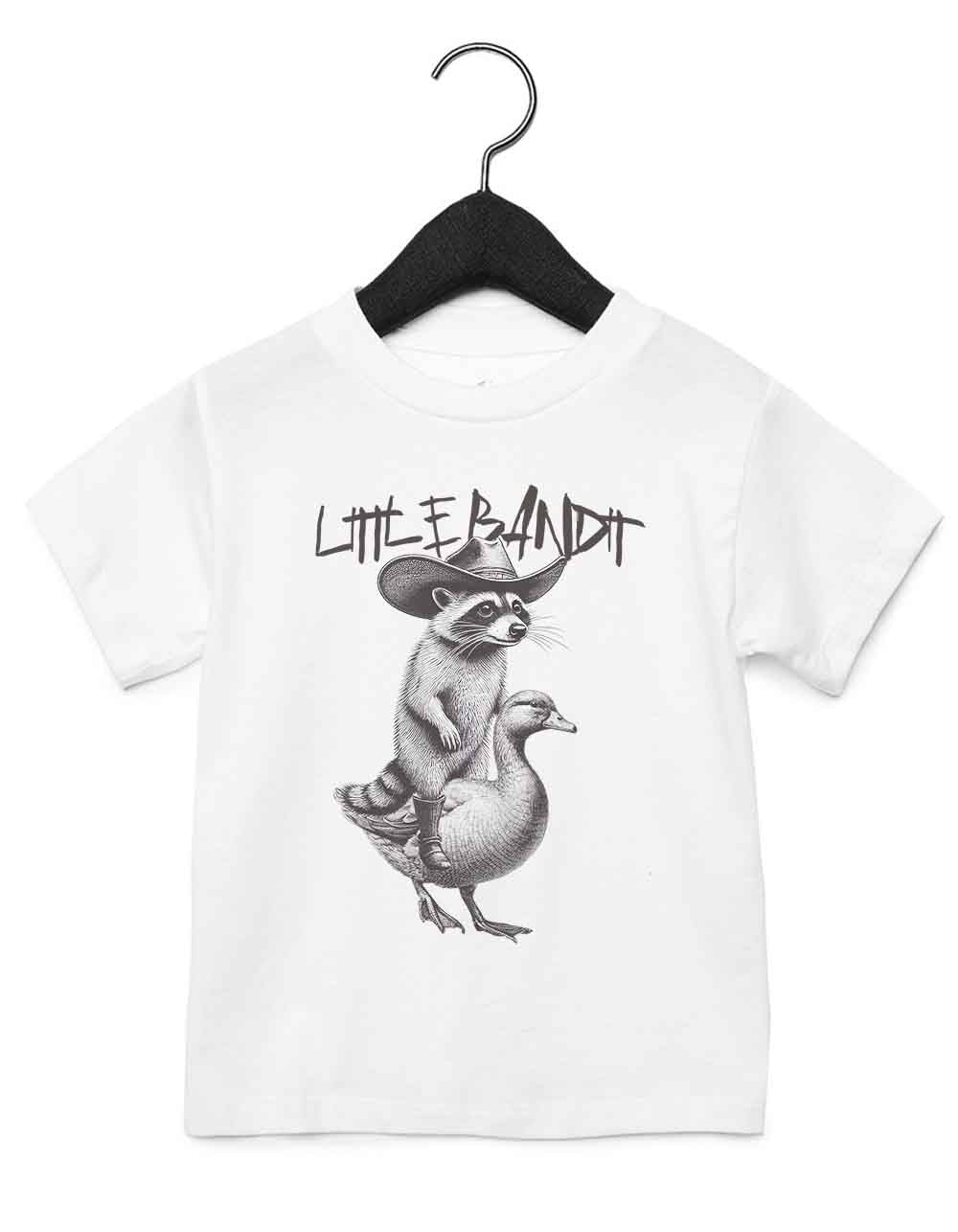 Toddler t-shirt featuring a funny illustrated animal design of a funny raccoon rriding a goose like a horse – playful and cool kids tee with bold nature-inspired graphic, perfect for adventurous toddlers, unique kids gift or trendy preschool outfit.