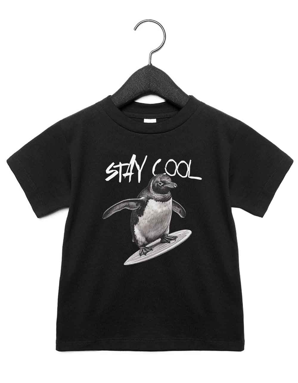 Toddler t-shirt featuring a funny illustrated animal design of a surfing penguin – playful and cool kids tee with bold nature-inspired graphic, perfect for adventurous toddlers, unique kids gift or trendy preschool outfit.