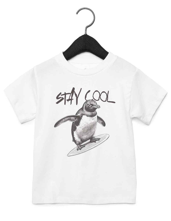Toddler t-shirt featuring a funny illustrated animal design of a surfing penguin – playful and cool kids tee with bold nature-inspired graphic, perfect for adventurous toddlers, unique kids gift or trendy preschool outfit.